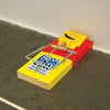 Mouse trap set on a floor 