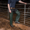 lifestyle image of the No Sweat Stormgear Waterproof Split Leggings worn on a farm